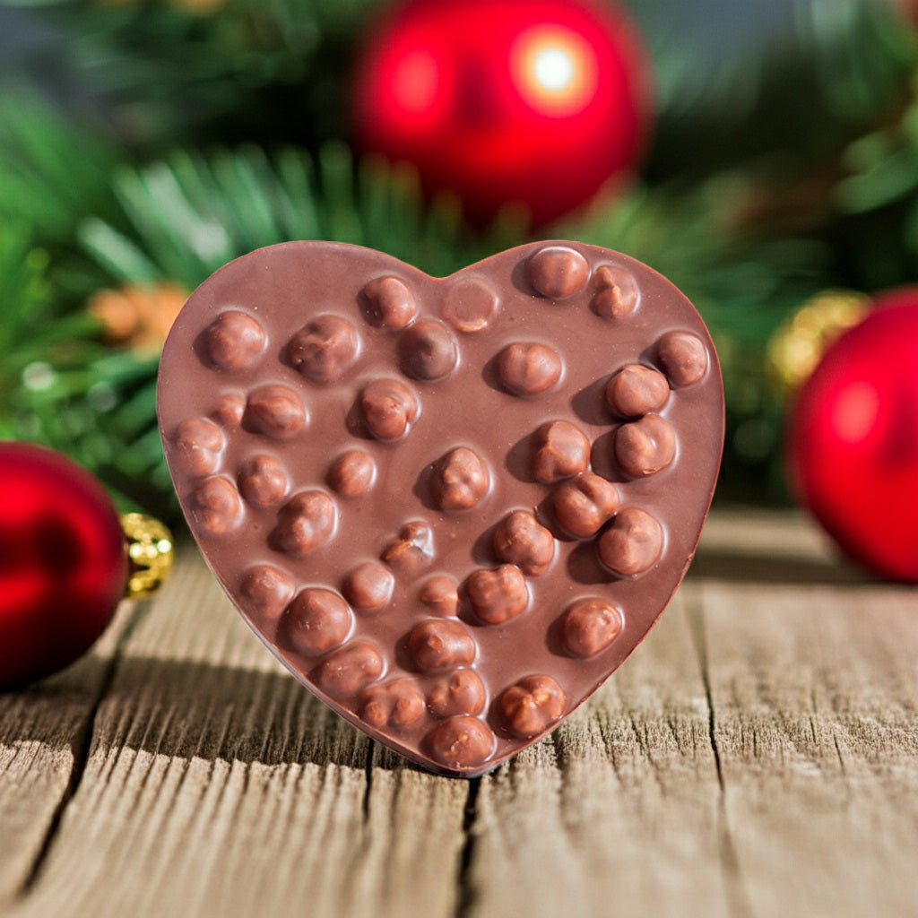 Aeschbach Schokolade Herz Milch mit Haselnüssen – 150 g